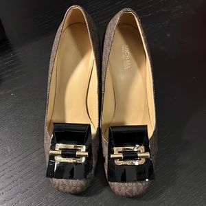 Lightly worn Michael Kors heel loafers- brown, black, gold buckle; sz 7.5